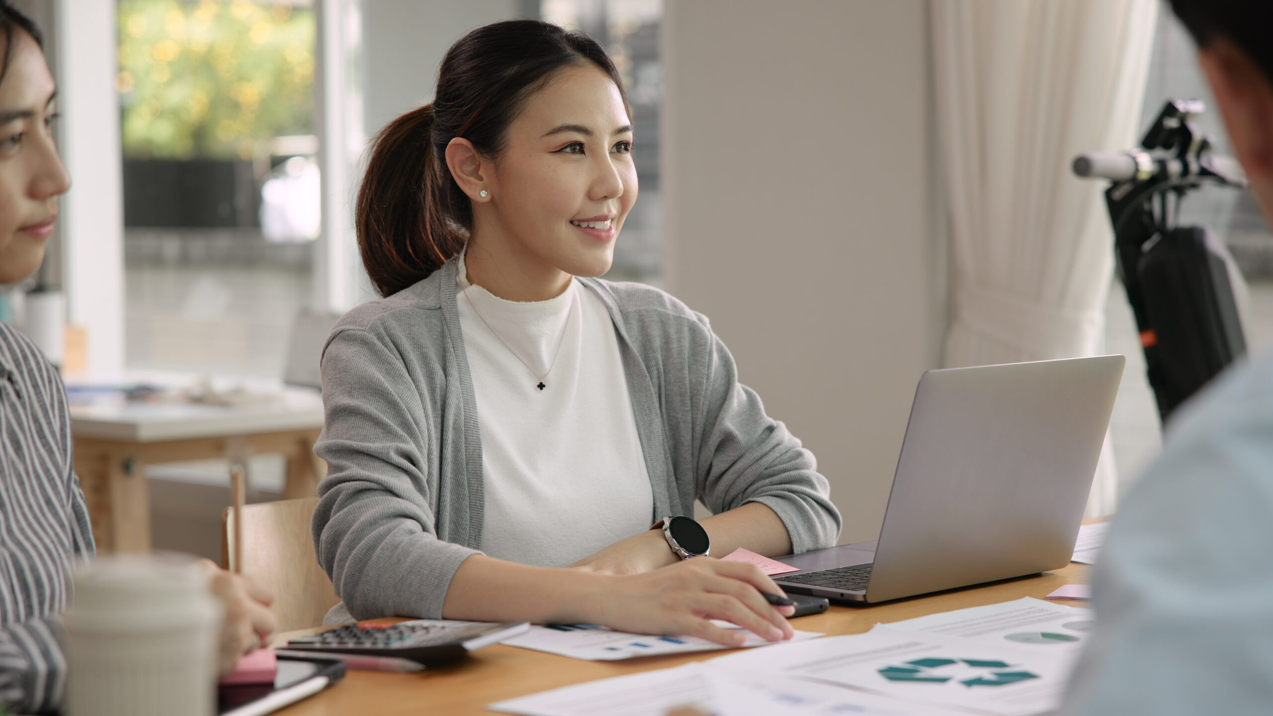 Data charts and graphs representing emissions reporting.